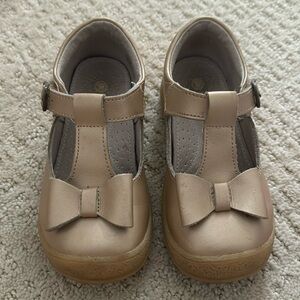 L’Amour gold bow shoes